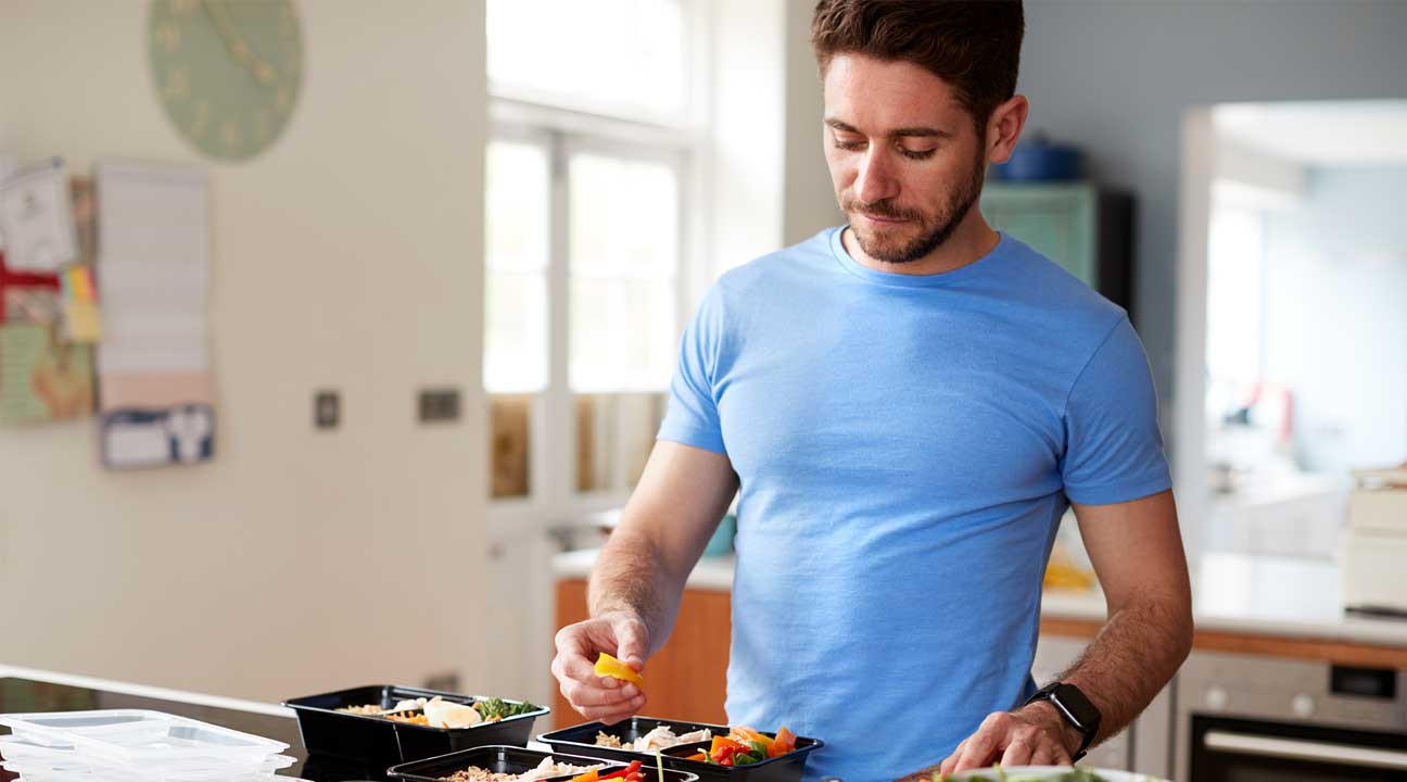 man prepping nutritional meals