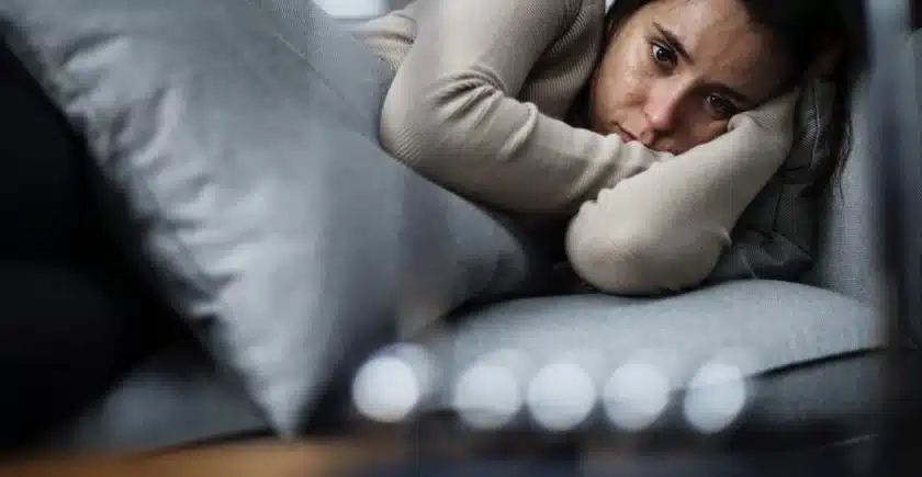 Depressed woman on couch